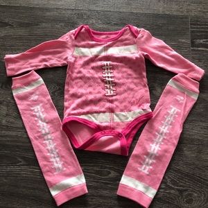 Pink football onsie with matching leg warmers